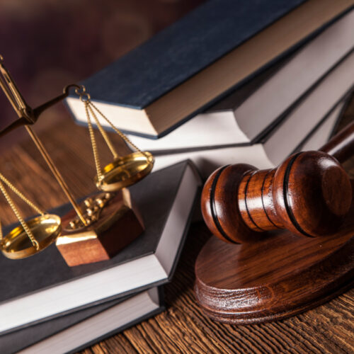 Mallet, legal code and scales of justice. Law concept, studio shots